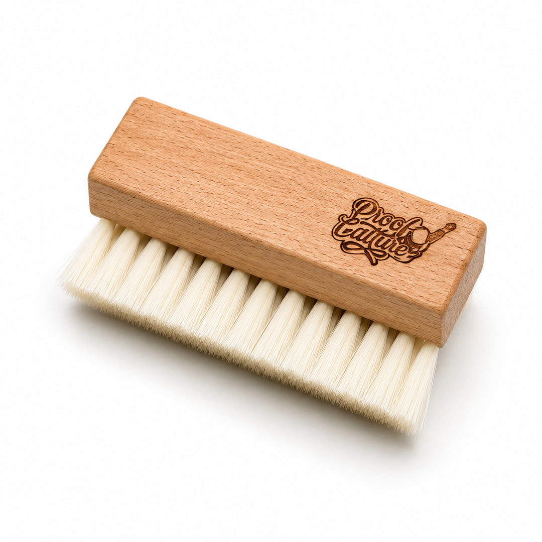 Proof Culture wood-handled sneaker brush with white hard bristles, product shot on white background