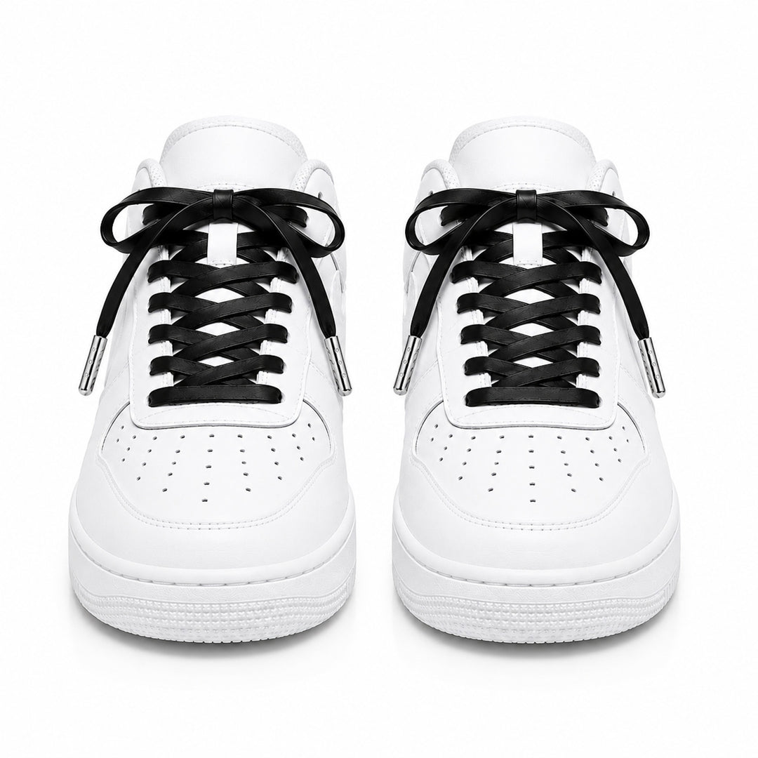 Black faux leather laces with silver metal tips