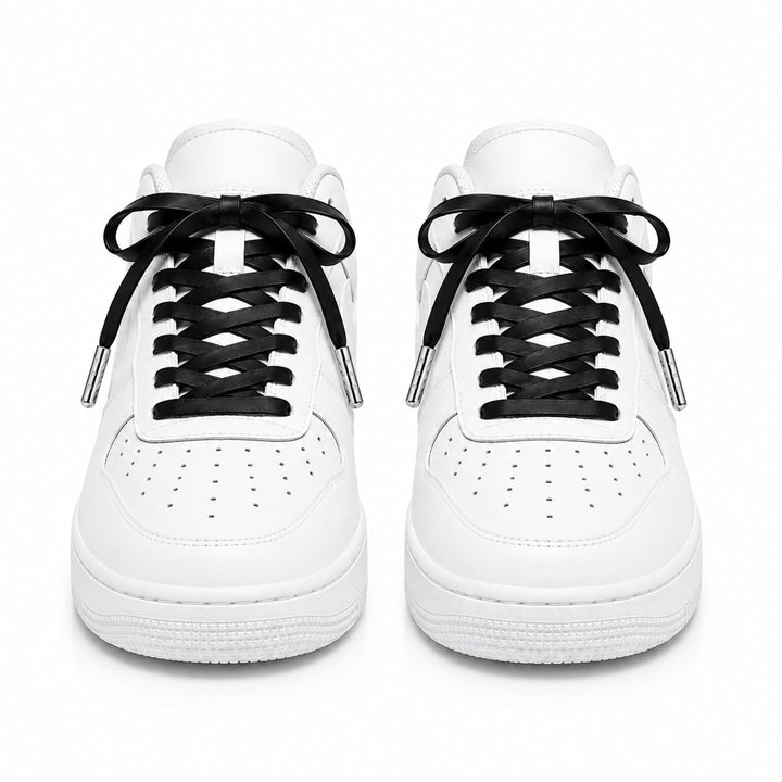 Black faux leather laces with silver metal tips