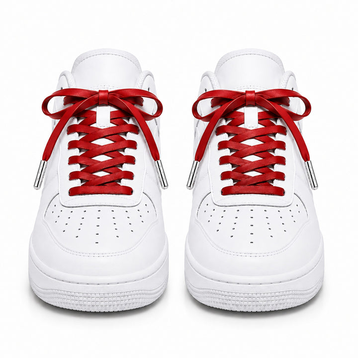 Red faux leather laces with silver metal tips