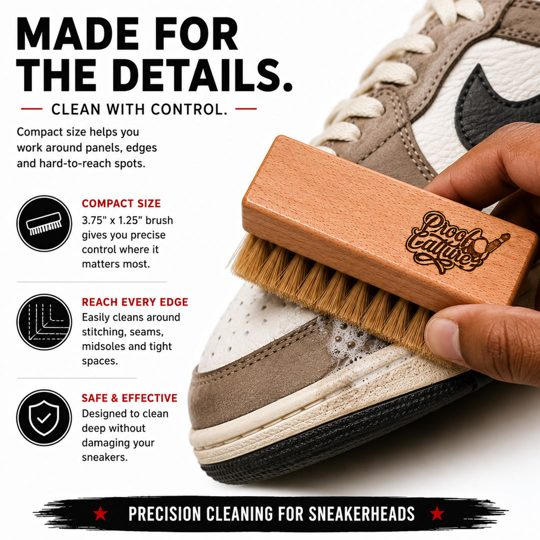 Close-up of the Proof Culture medium bristle brush cleaning stitching and seams on a tan sneaker